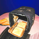 Illustration for article titled Foldable Fabric Oven, For Baking On the Go